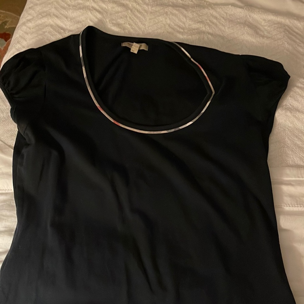 Burberry cotton spandex short puffy  sleeve. Used but in good condition.